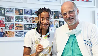 AOP Tatjana Pinto mit WM Bronze Medaille 2022 gemeinsam mit Dr. Carsten Radas